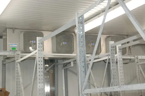 Commercial refrigeration evaporator units installed inside a cold storage facility for consistent temperature control and reliable cooling.