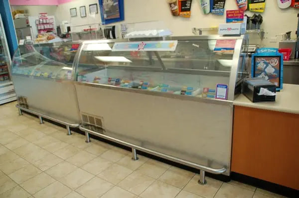 Refrigerated display case installation in a retail shop, providing consistent cooling and front-of-house product display.
